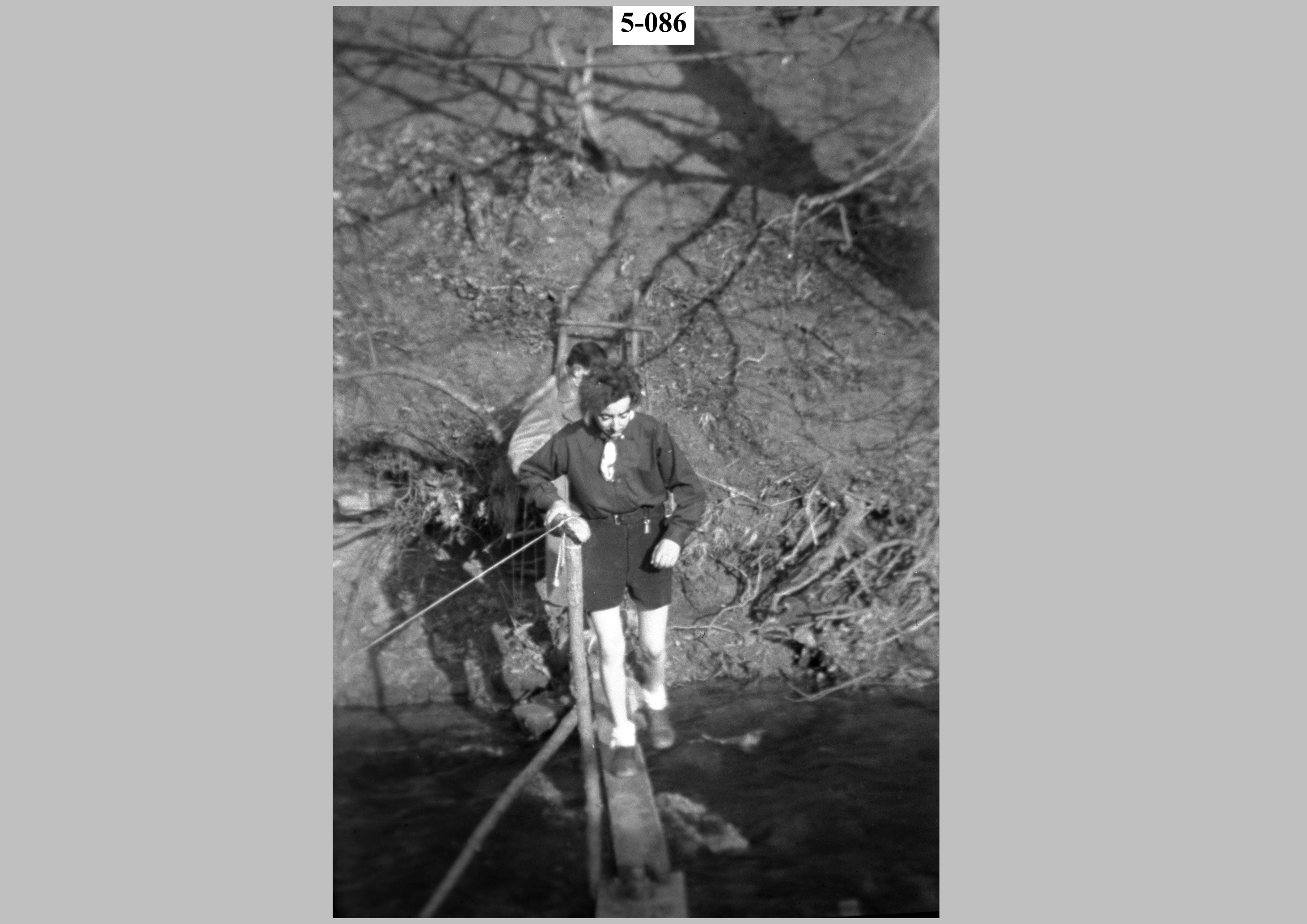 Girl Guides crossing a stream.jpg