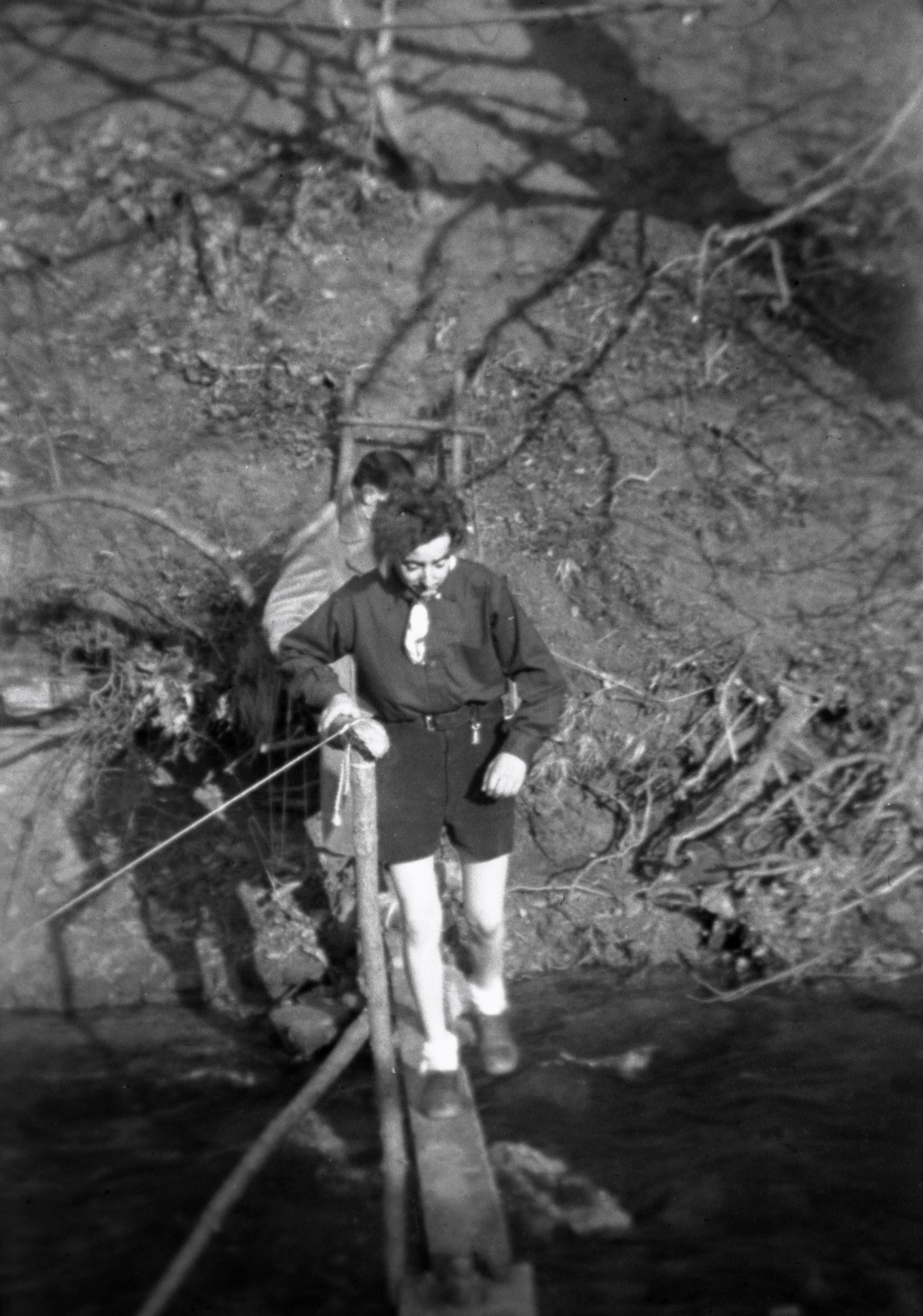 Girl Guides crossing stream close up.jpg