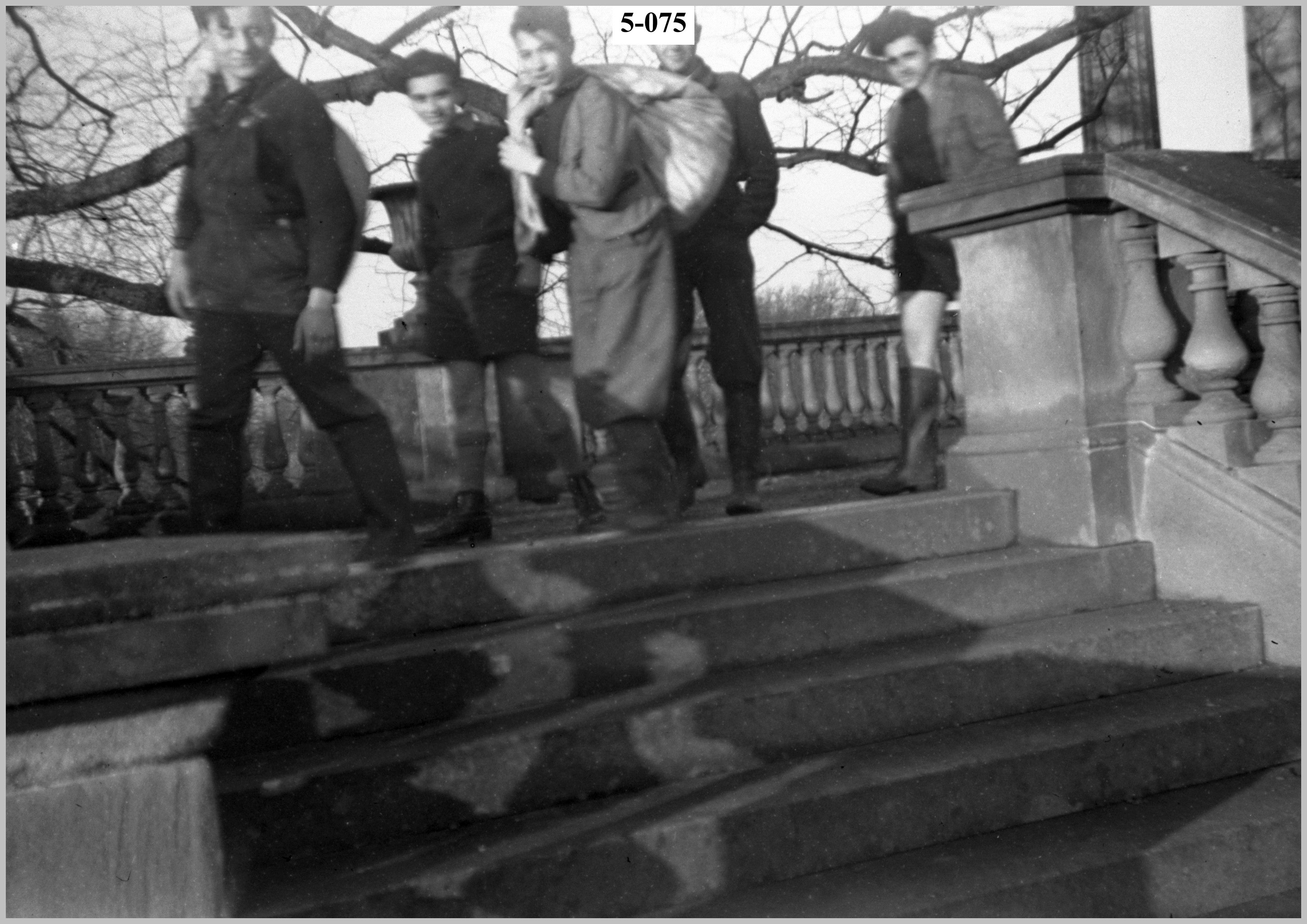 Group of boys carrying bags.jpg