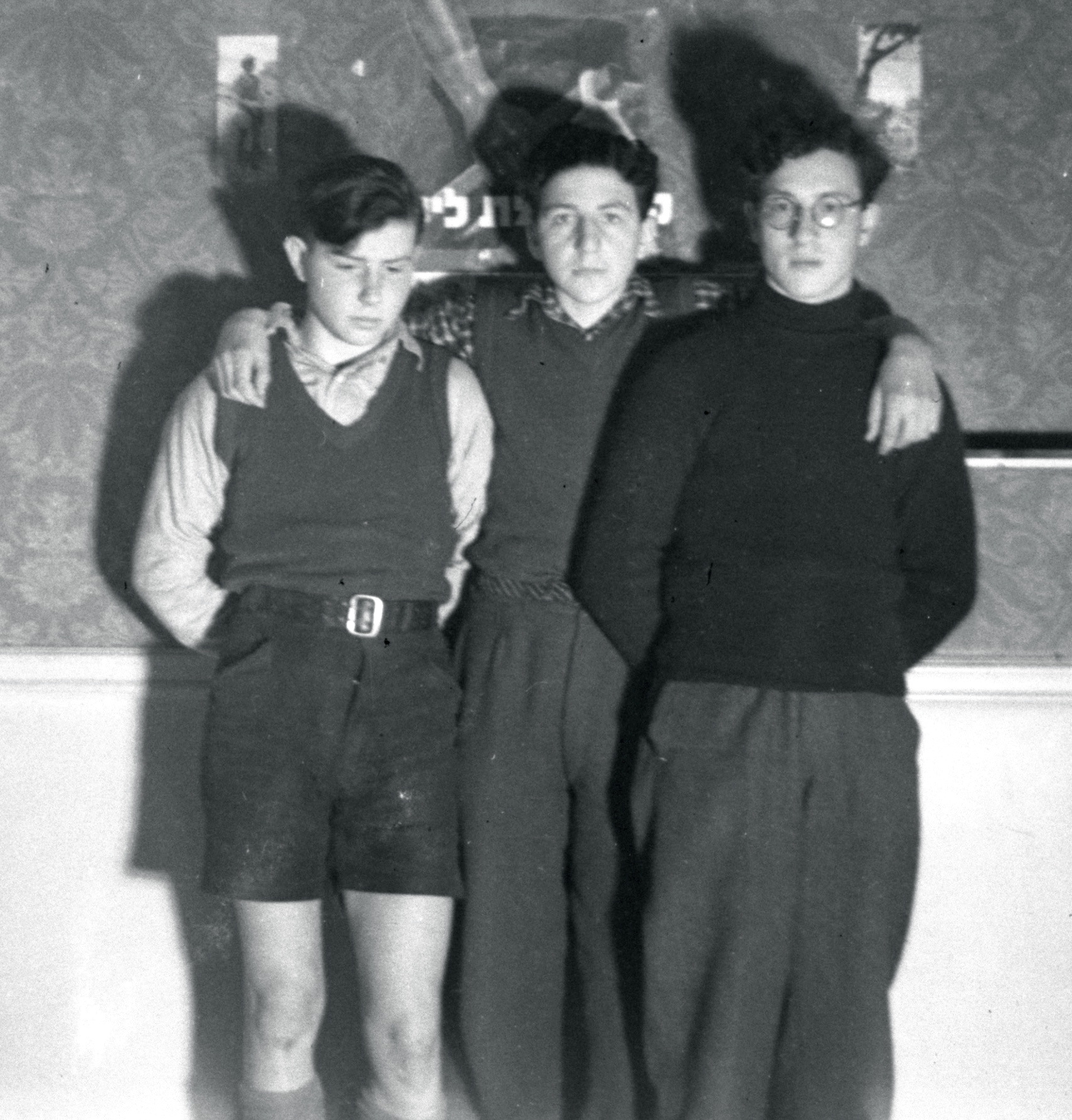 Three unknown boys indoors.jpg