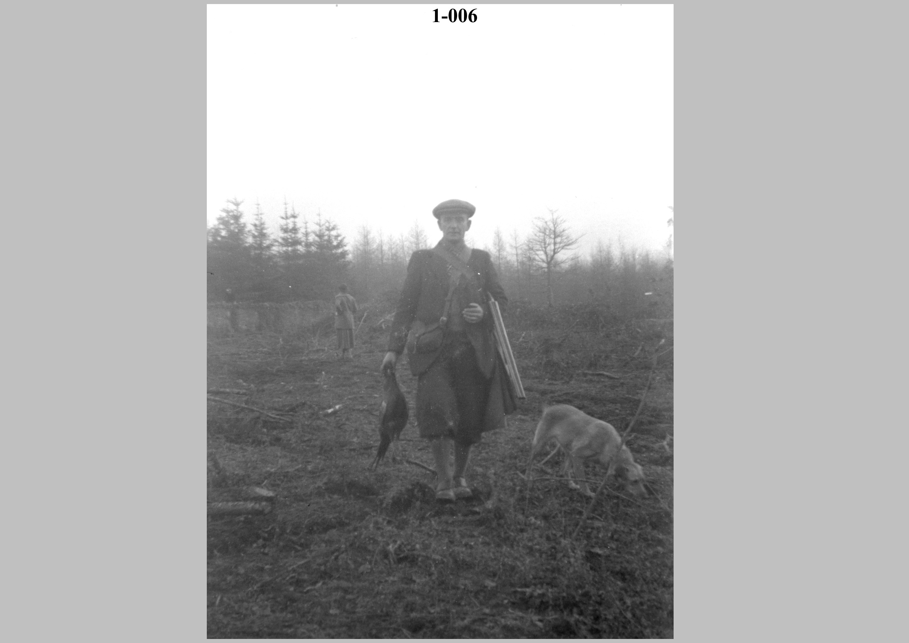 Gamekeeper & dead pheasant.jpg