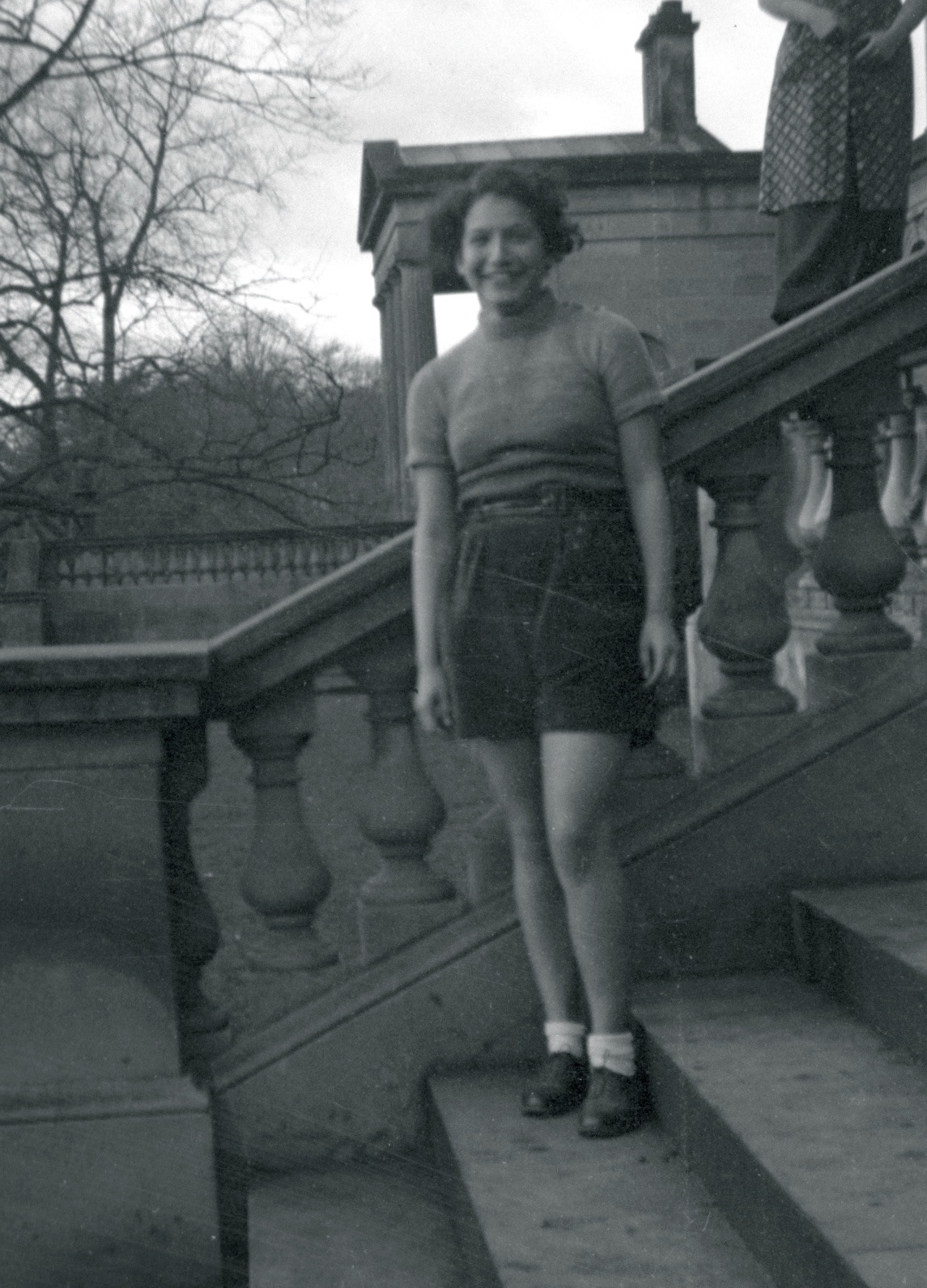 Girl in shorts on step.jpg