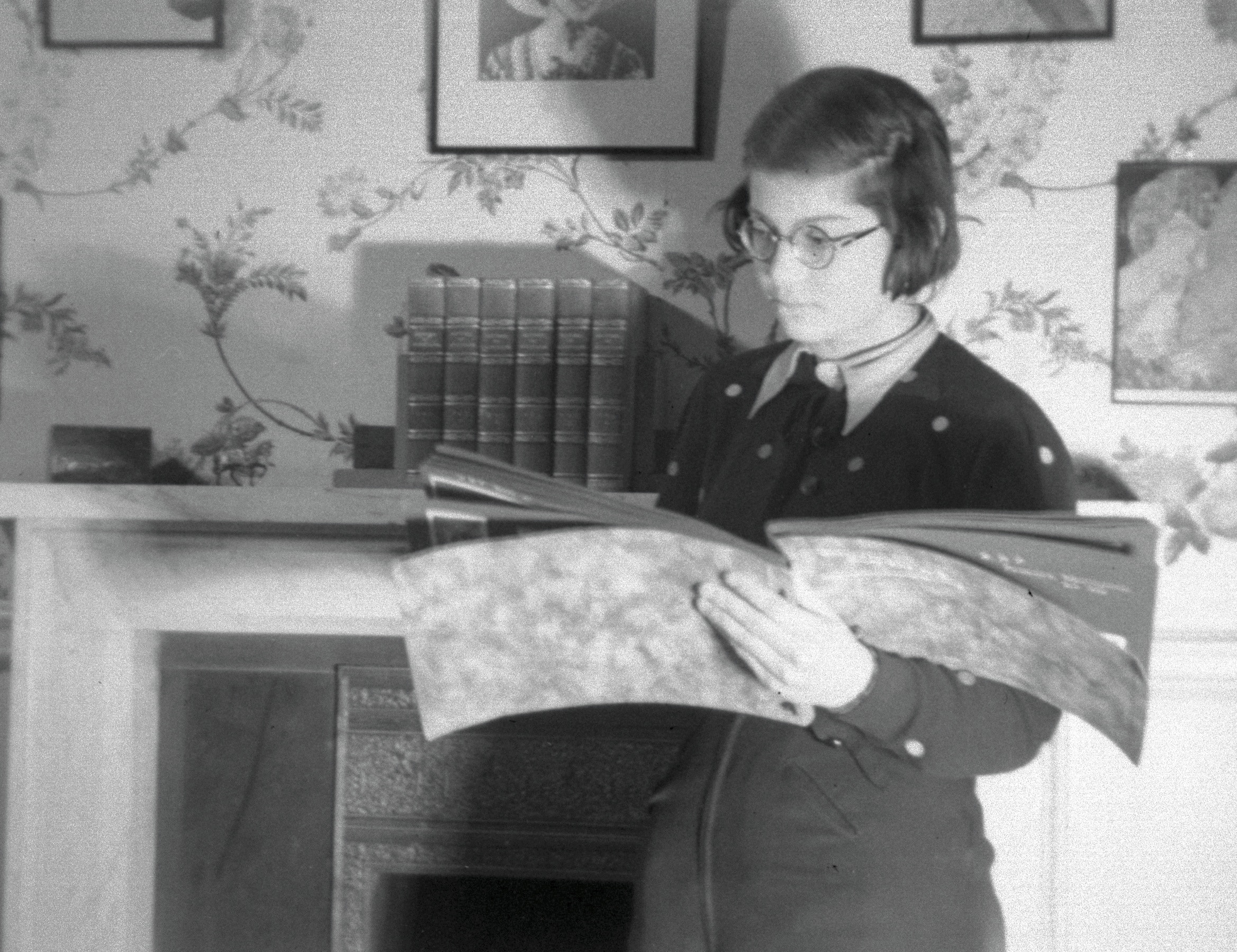 Girl looking at album.jpg