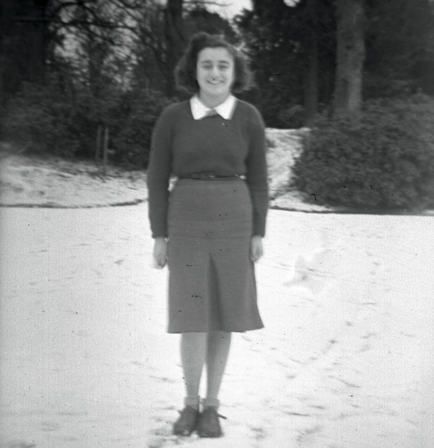 Girl standing in the snow.jpg