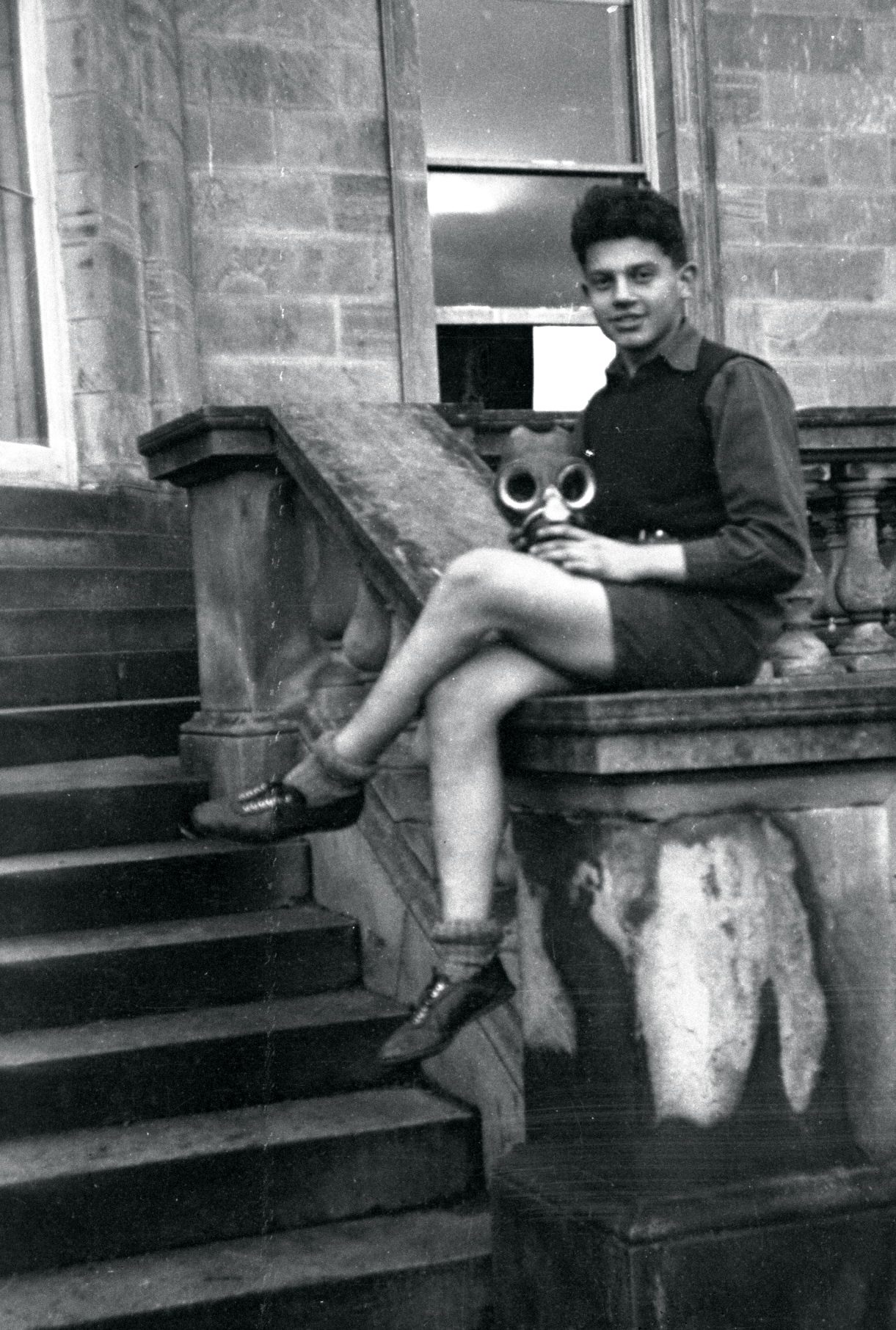 Boy with with gasmask off.jpg