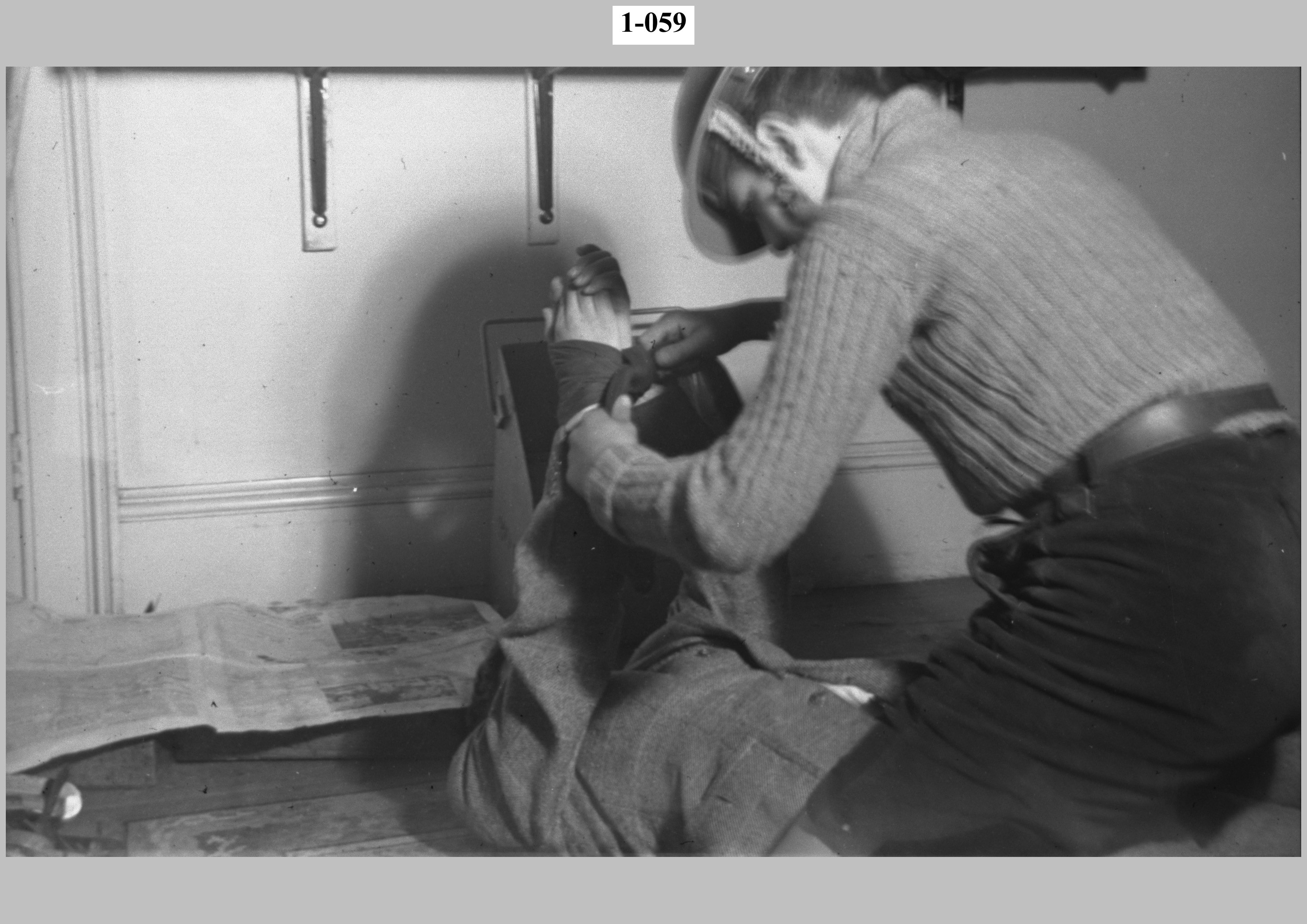 Two boys practicing casualty removal.jpg