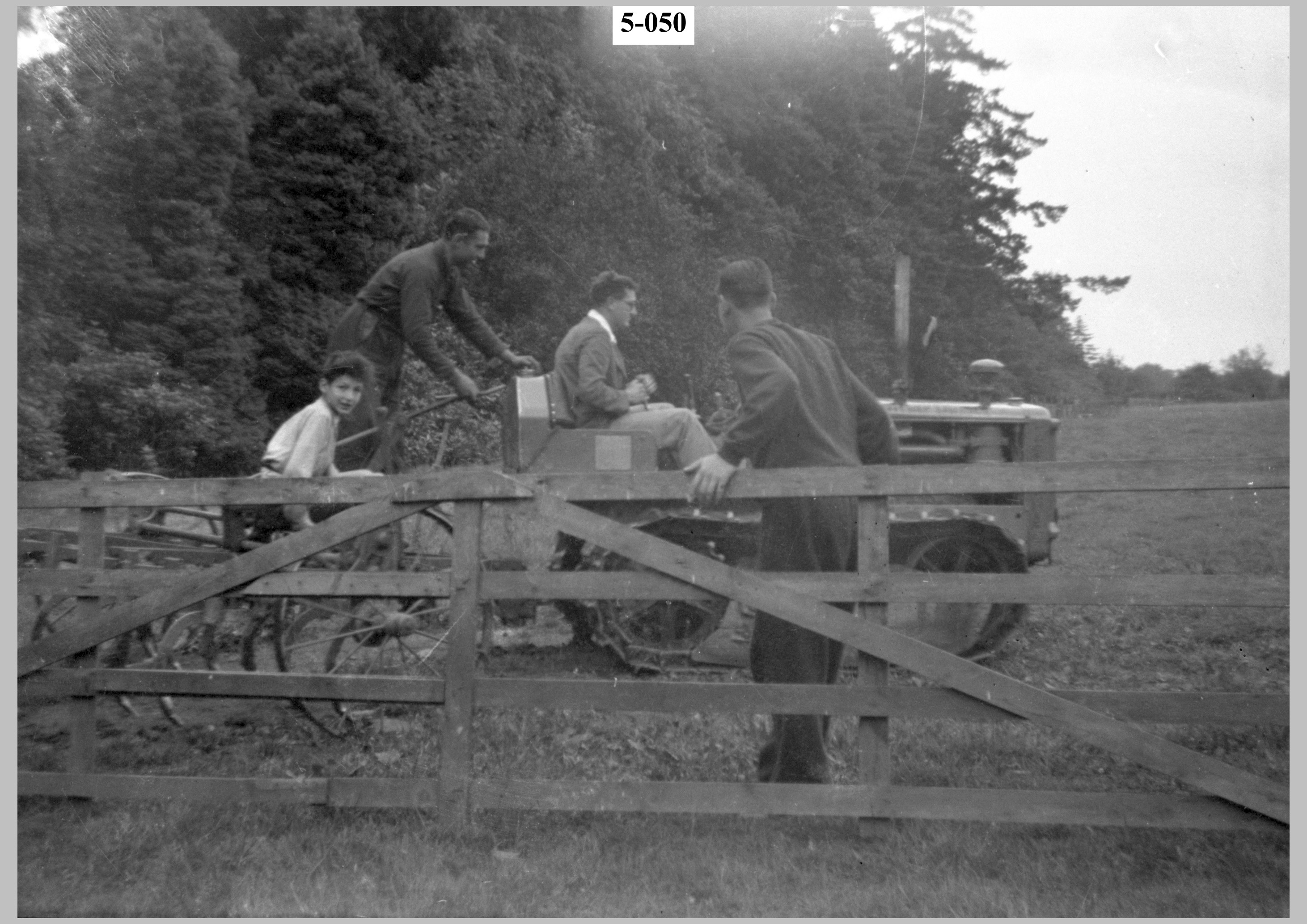 Pupils & teacher on caterpillar tractor.jpg