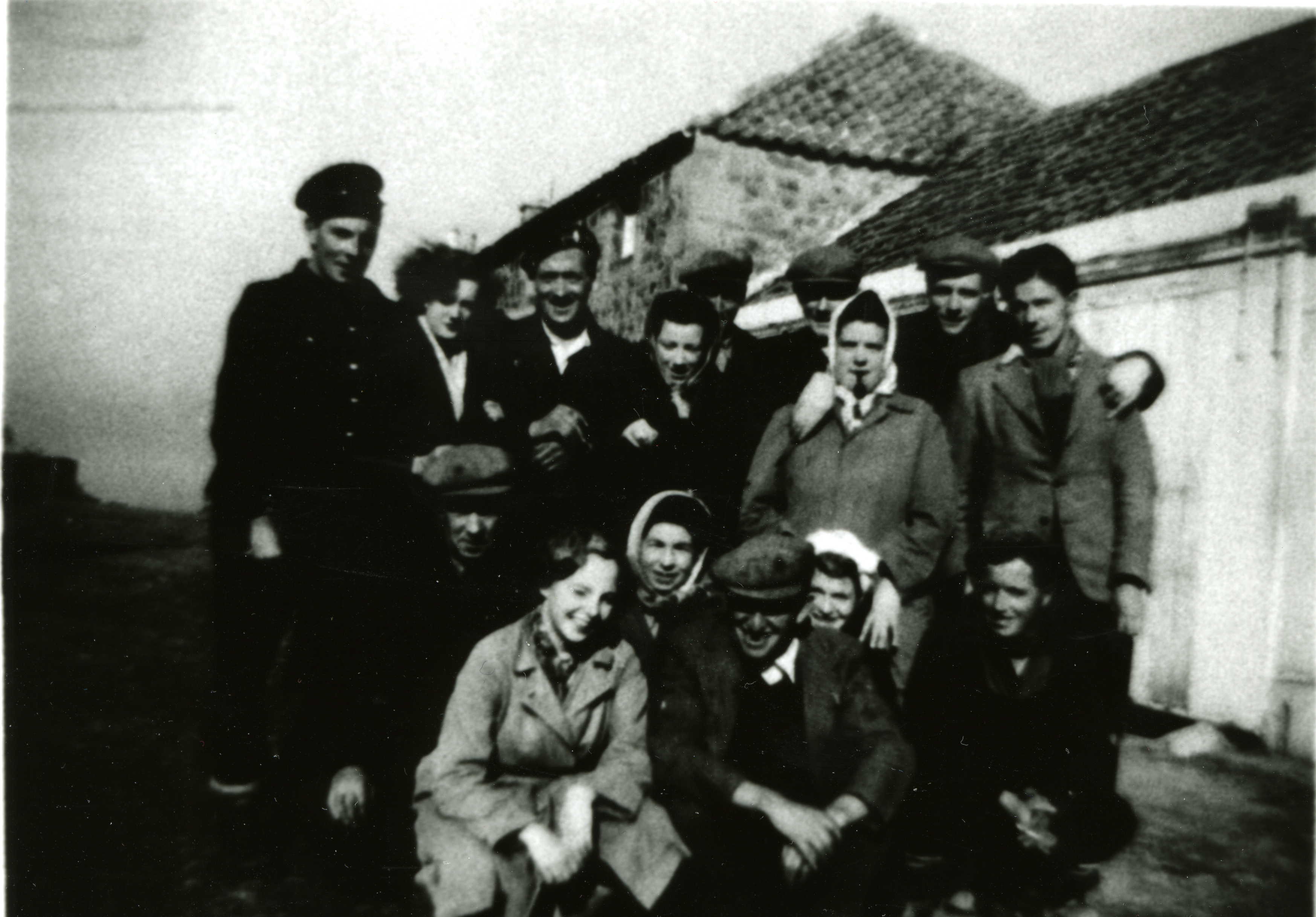 A group of Italian PoWs, farm workers and WLA, Kilduff , 1944.jpg