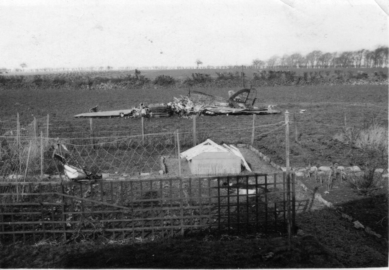 Remains of burnt out Hurricane behind Haldane Avenue.jpg